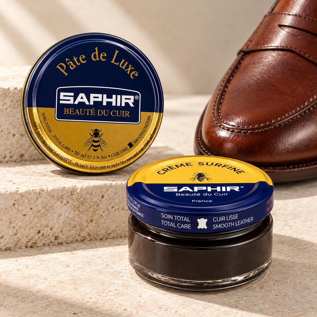 Saphir Pâte de Luxe and Crème Surfine on limestone with a chestnut leather loafer