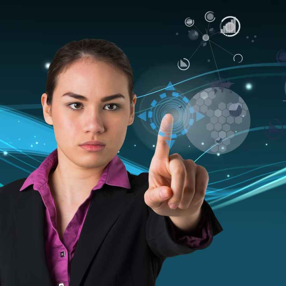 Woman in a suit touches a digital interface with floating graphs and patterns. Background is dark with blue waves. Focused expression.