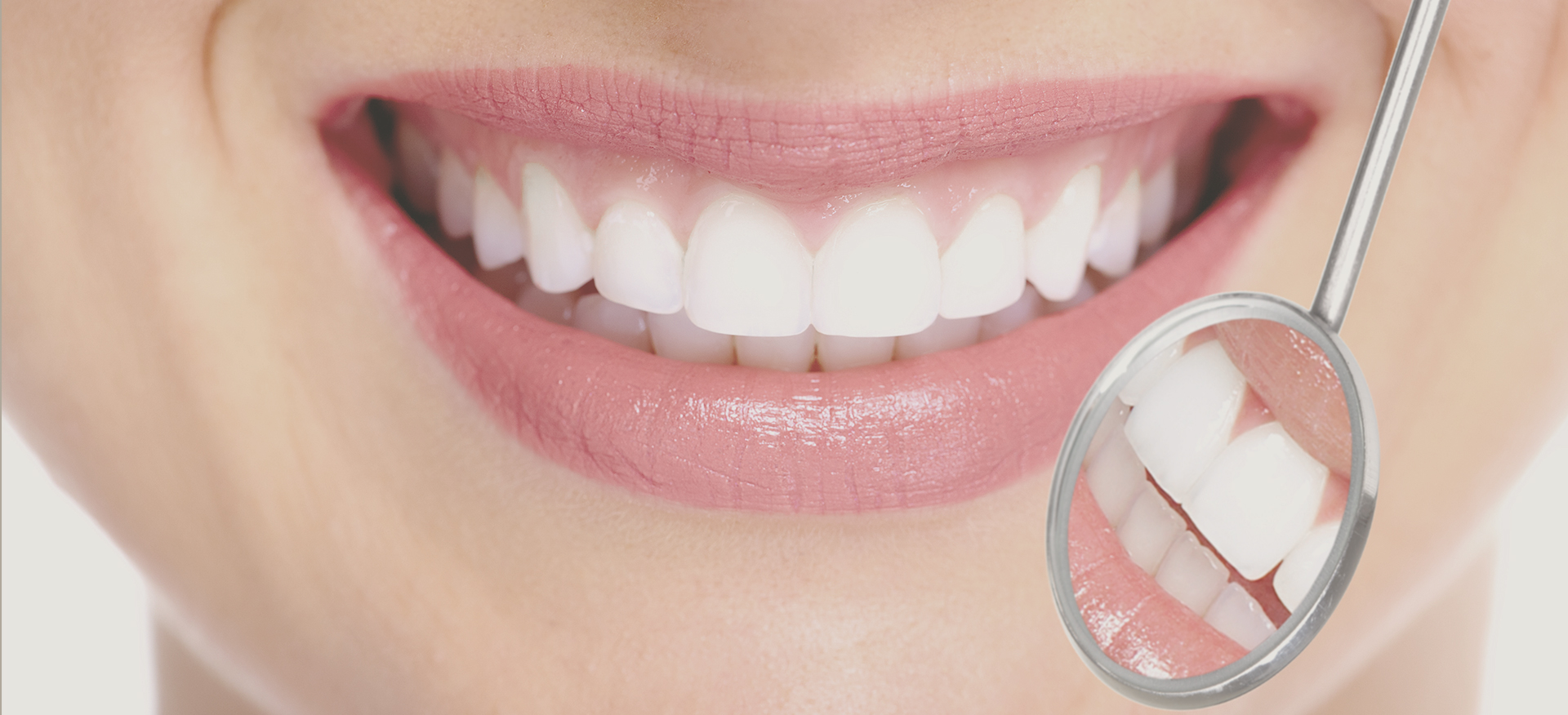Healthy smile with dental mirror
