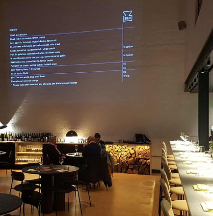 Silo has a menu projected on the wall to reduce paper wastage