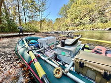 An empty whitewater raft on the Shenandoah River, used for guided river trips offered by Shenandoah Valley Adventure Co.