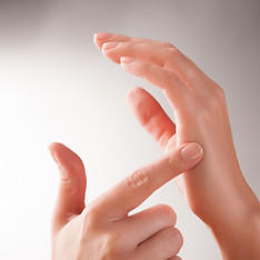 Hands showing how to do chinese acupressure