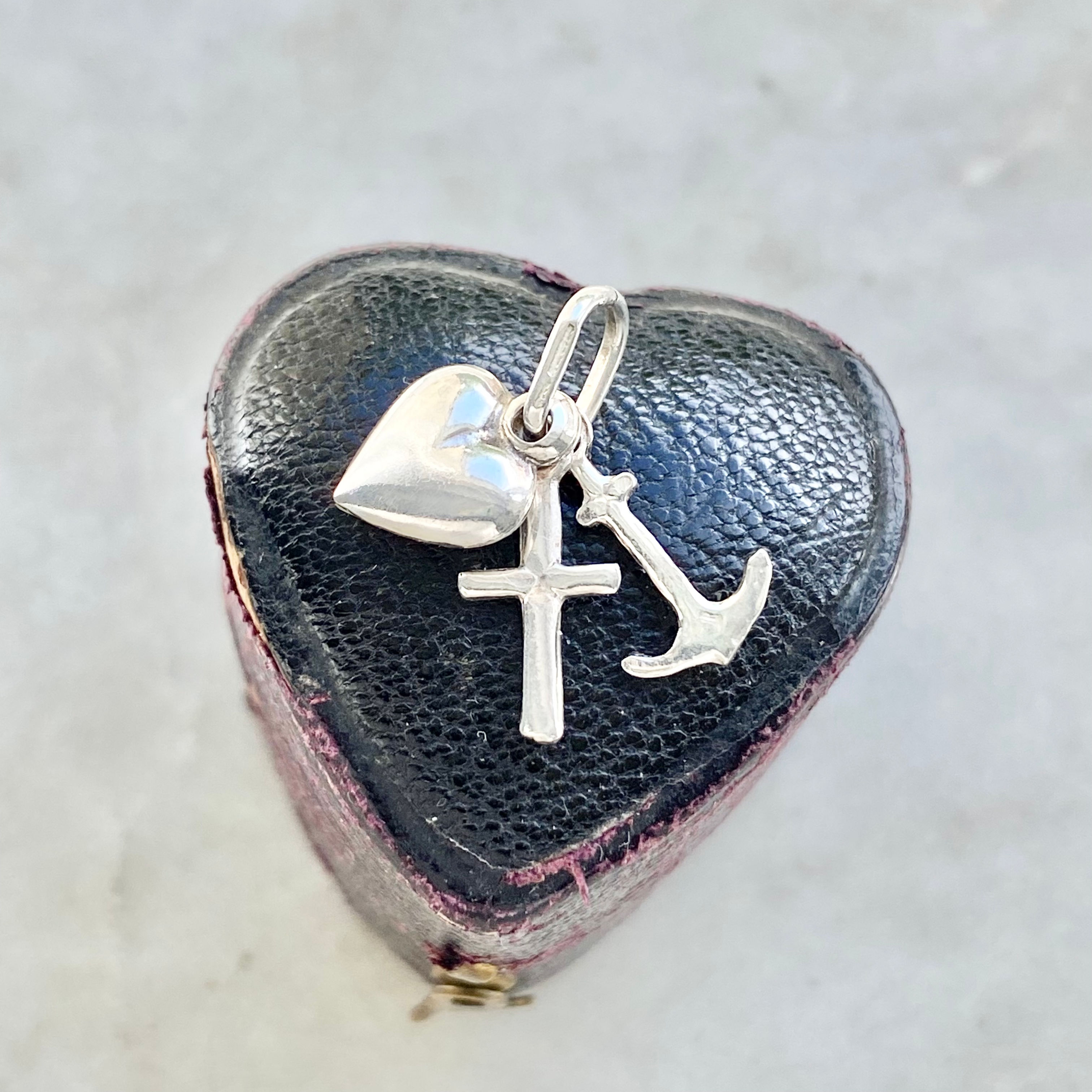 Vintage silver faith, hope and charity charm
