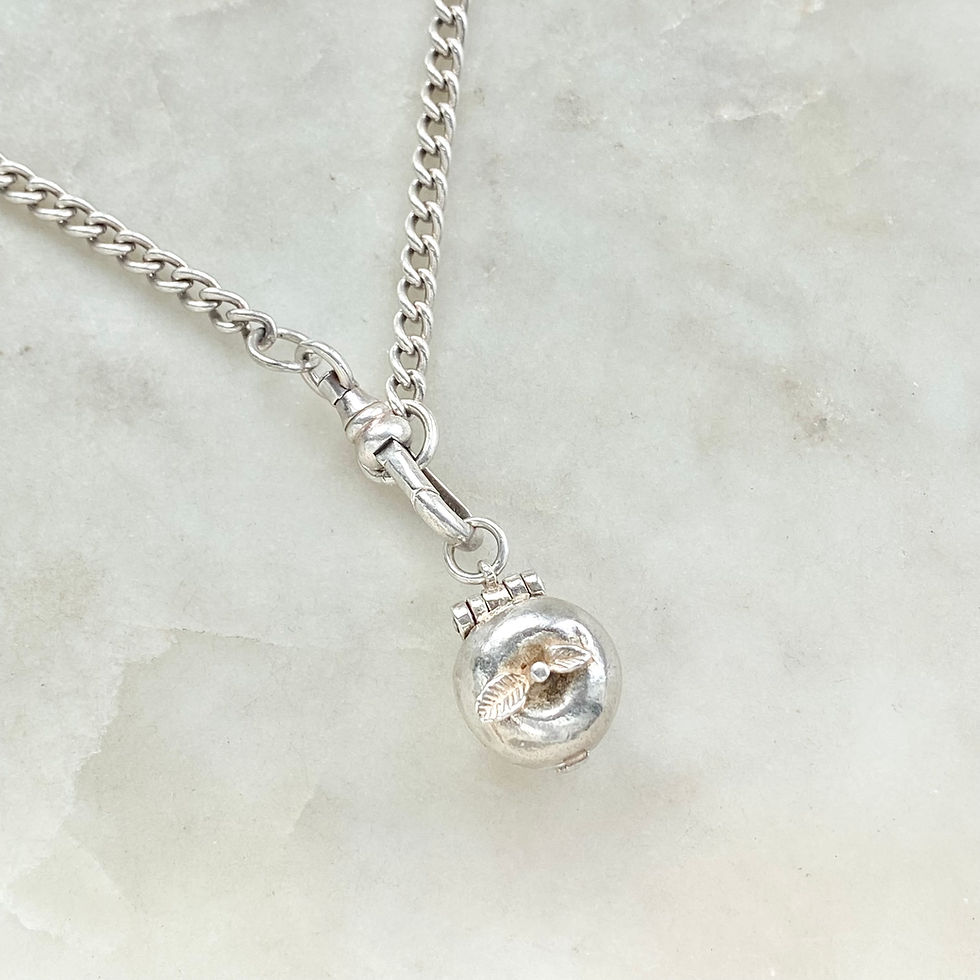 Thumbnail: Vintage sterling silver opening apple charm with Adam and Eve inside