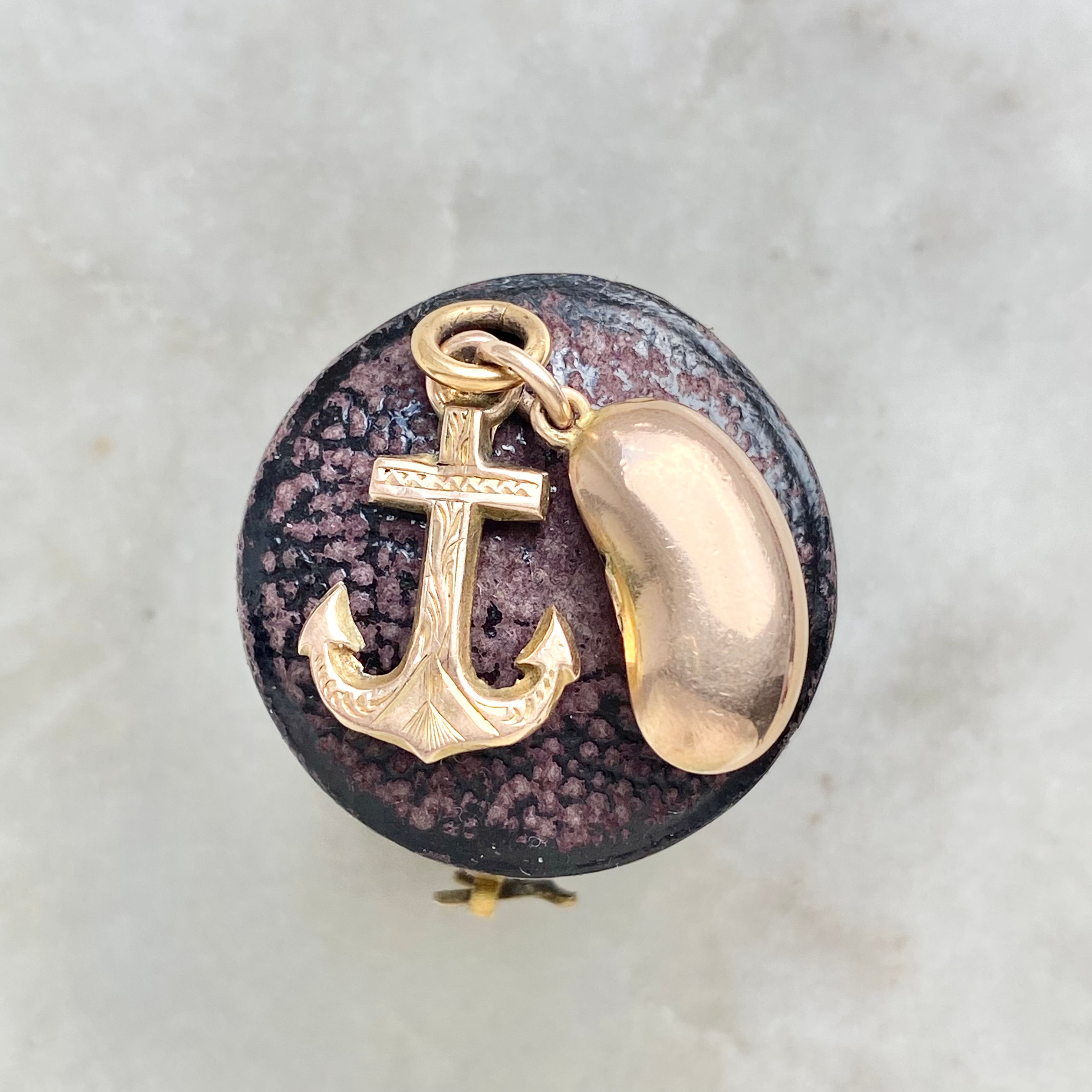 Vintage gold lucky bean and anchor charm