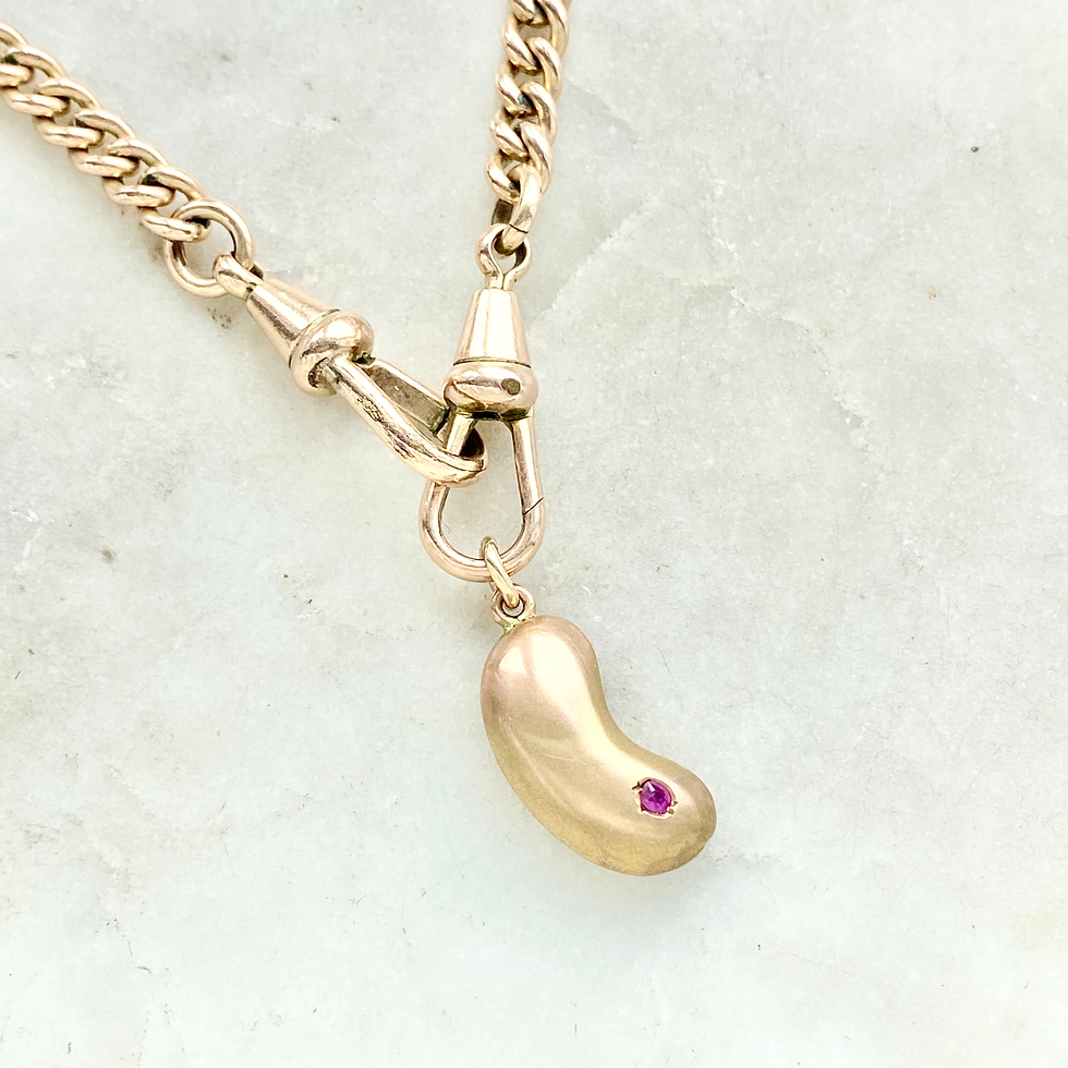 Thumbnail: Vintage 9ct gold and ruby lucky bean charm