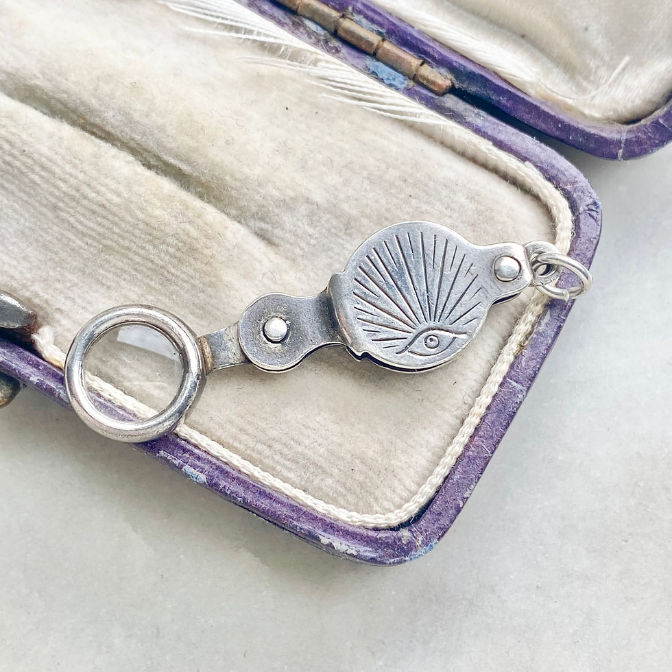 Thumbnail: Vintage sterling silver evil/all seeing eye charm with magnifying glass