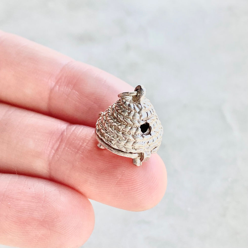 Thumbnail: Vintage sterling silver opening beehive charm with bee inside