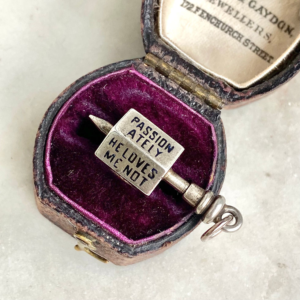 Thumbnail: Antique rare silver and enamel 'he loves me' daisy spinning top charm