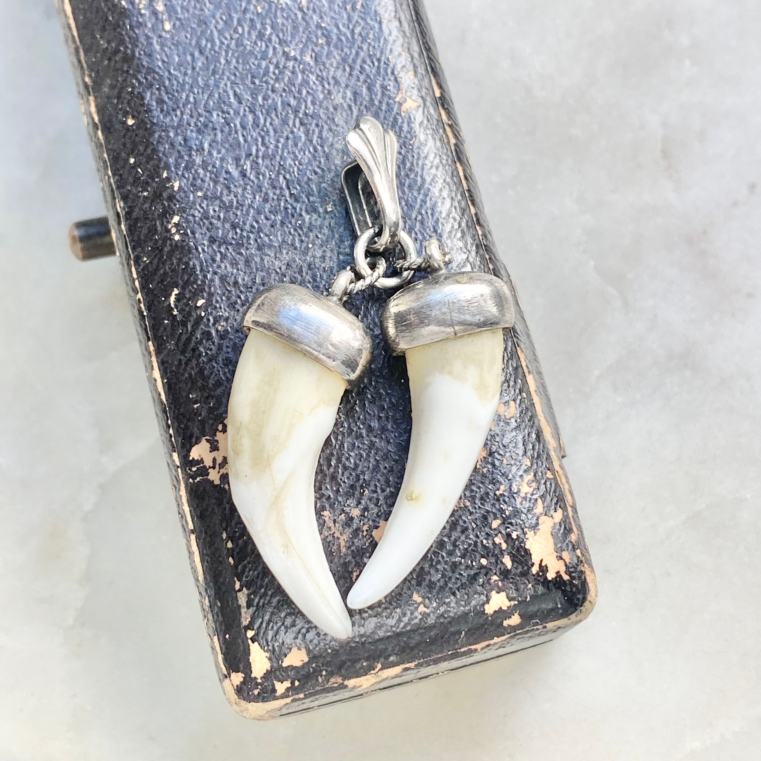 Antique silver teeth pendant