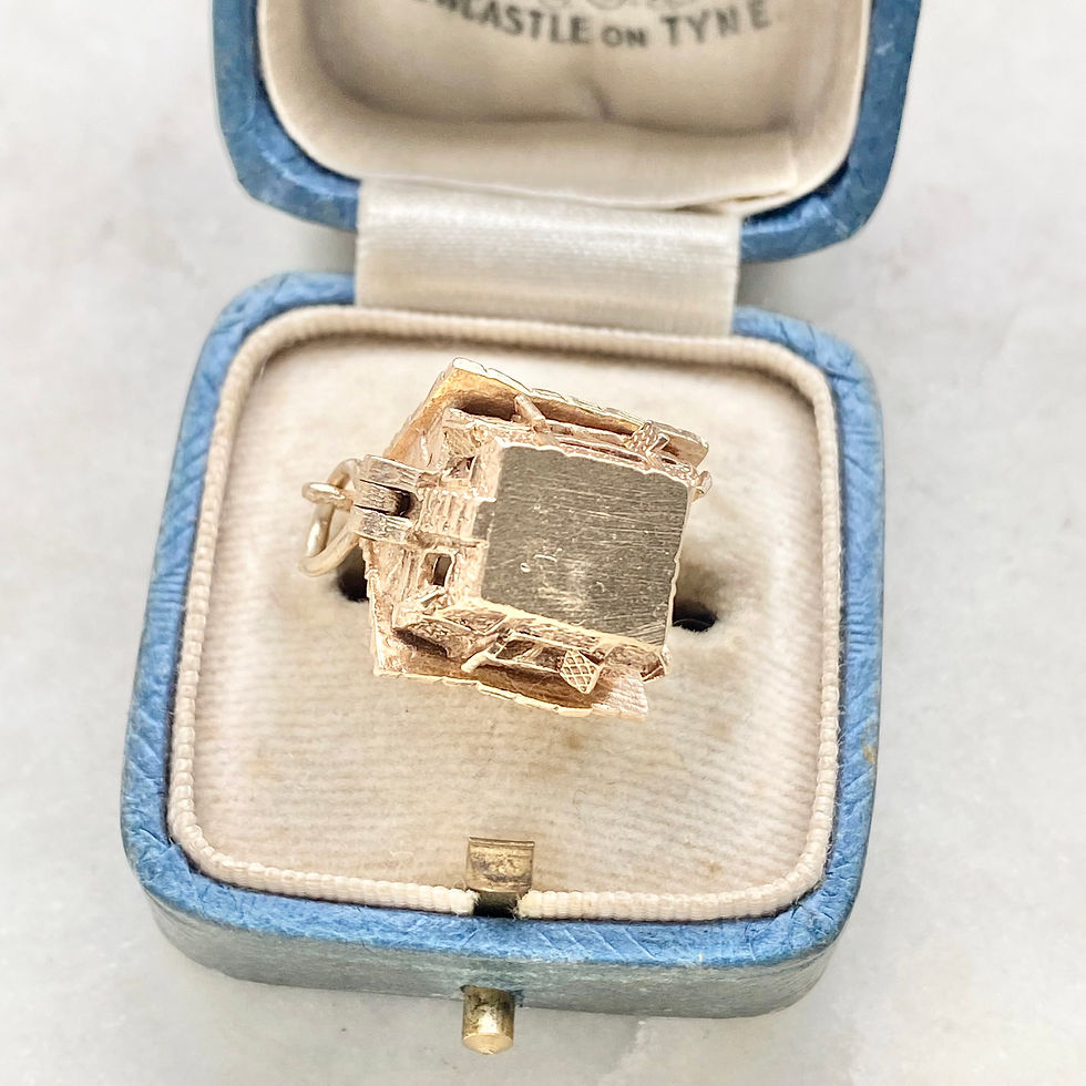 Thumbnail: Vintage 9ct gold opening haunted house charm with ghost inside