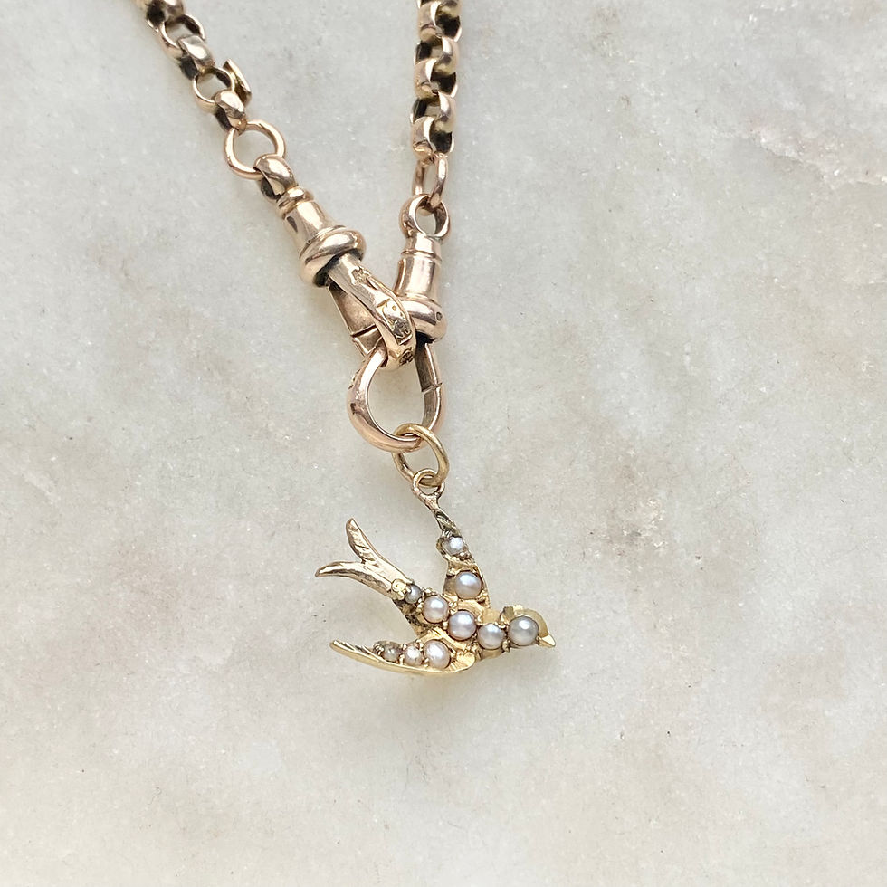Thumbnail: Vintage gold and seed pearl swallow charm
