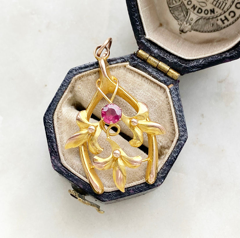 Antique 9ct gold and garnet wishbone charm