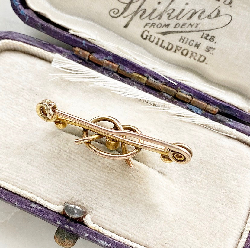 Thumbnail: Antique 9ct gold and turquoise love knot pin brooch
