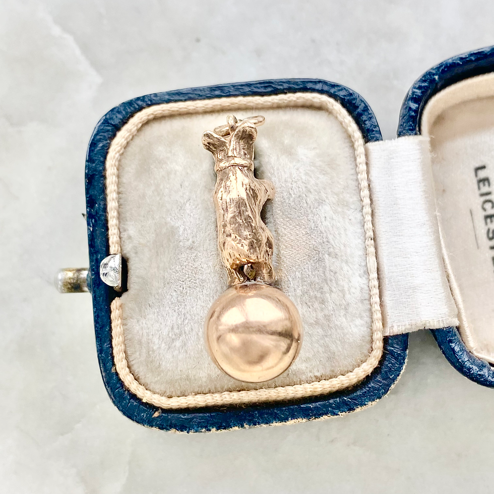 Thumbnail: Vintage heavy 9ct gold and diamond bear balancing on a ball charm