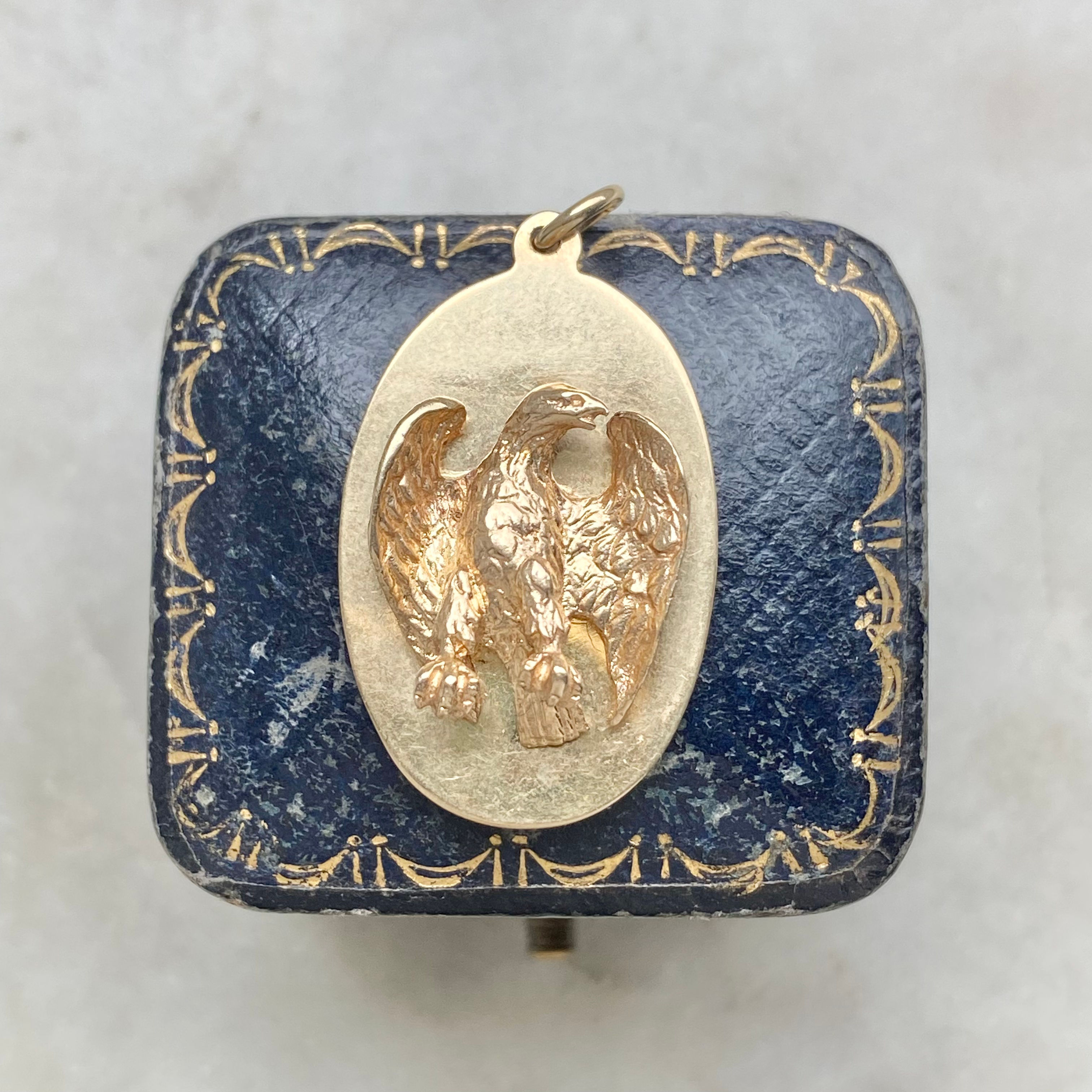 Vintage gold oval eagle charm/pendant