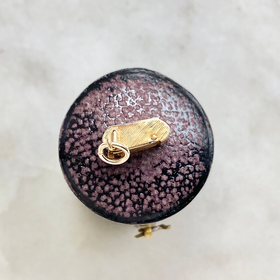 Thumbnail: Vintage gold opening sprung camera charm with lens inside