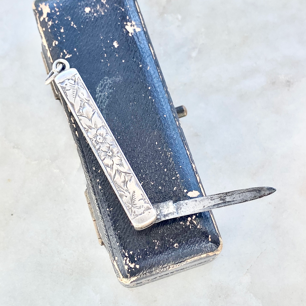 Thumbnail: Vintage silver opening fruit knife pendant
