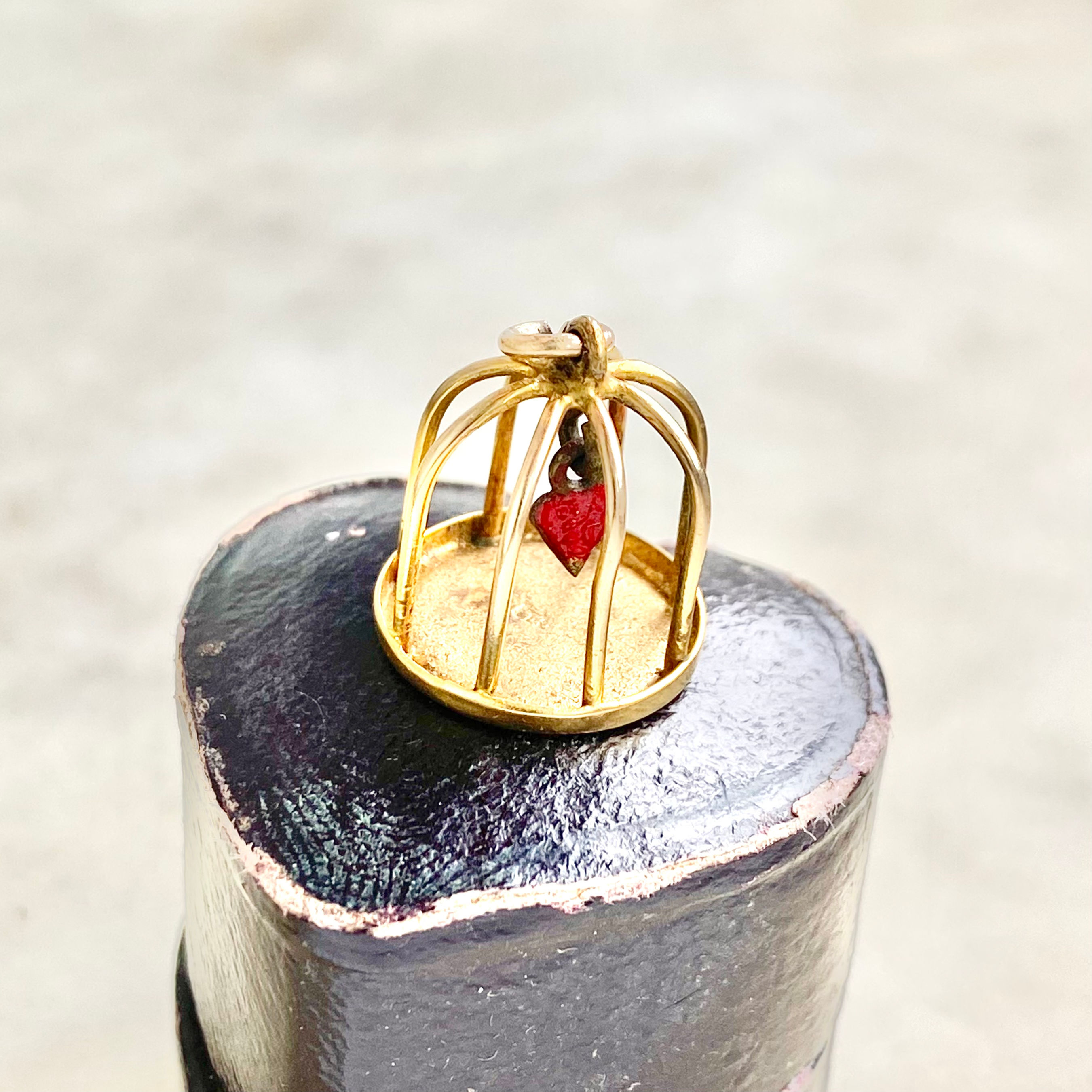 Vintage 9ct gold and enamel heart in a cage charm