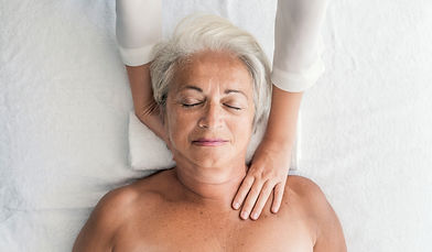 Woman-Receiving-neck-Massage-1048243108_3866x2580.jpeg