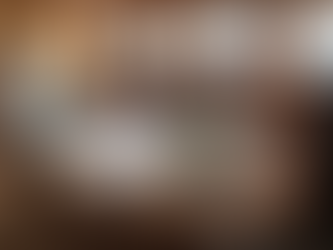 Yacht interior designers collaborating in yacht conference room