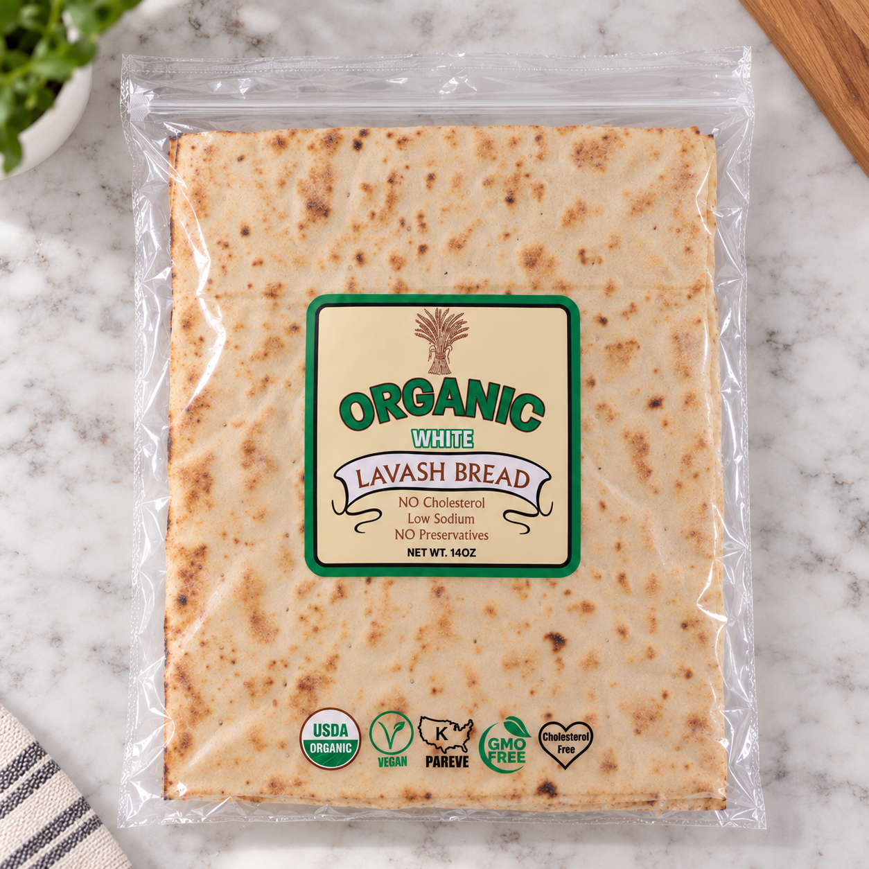 Organic White Lavash Bread in its retail package, photographed flat on marble