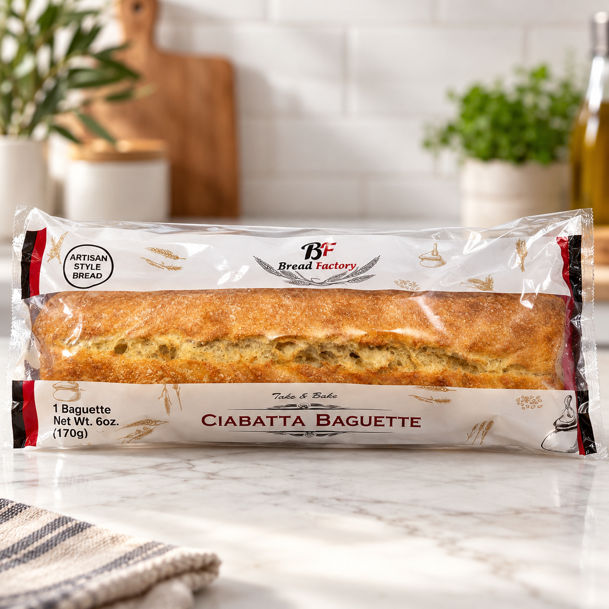 Bread Factory Ciabatta Baguette in its retail package on a marble countertop