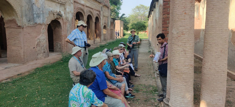 Foreign travelers with the Deep Dive India team exploring The Residency in Lucknow, delving into its historical significance.