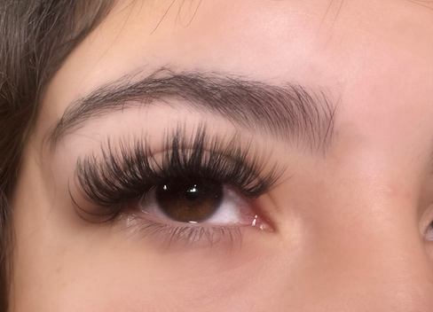 Full set of eyelash extensions applied by Uncommon Esthetics