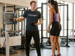 Patient working with a provider at a performance physical therapy clinic in Charleston