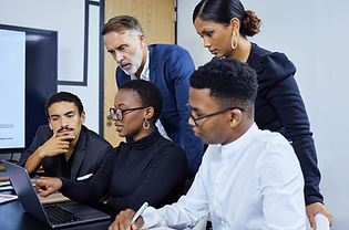 shot-of-a-group-of-businesspeople-working-together-2025-04-05-22-15-03-utc.jpg