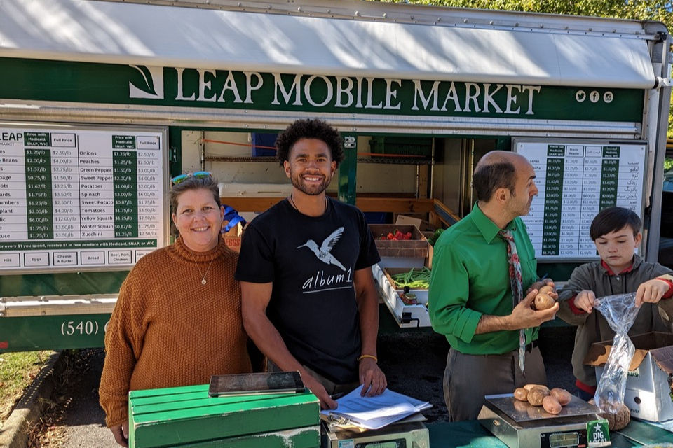 Connie Kenny (left) and operates the LEAP Mobile Market, offering discounted fruits and vegetables for customers with SNAP, WIC, and Medicaid.