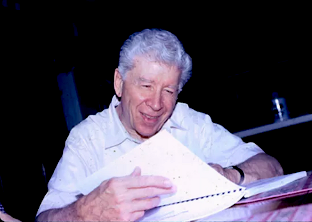 John Elliott checking out Vertical Truth: Chordal Mechanisms for the Guitar