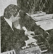 John Elliott at the piano.