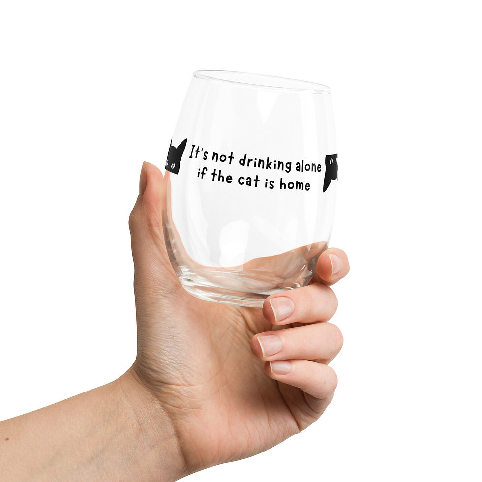 Thumbnail: Glass stemless wine glass reading "It's not drinking alone if the cat is home" in black