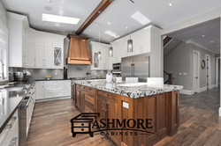 Elegant White Kitchen With Wood Hood