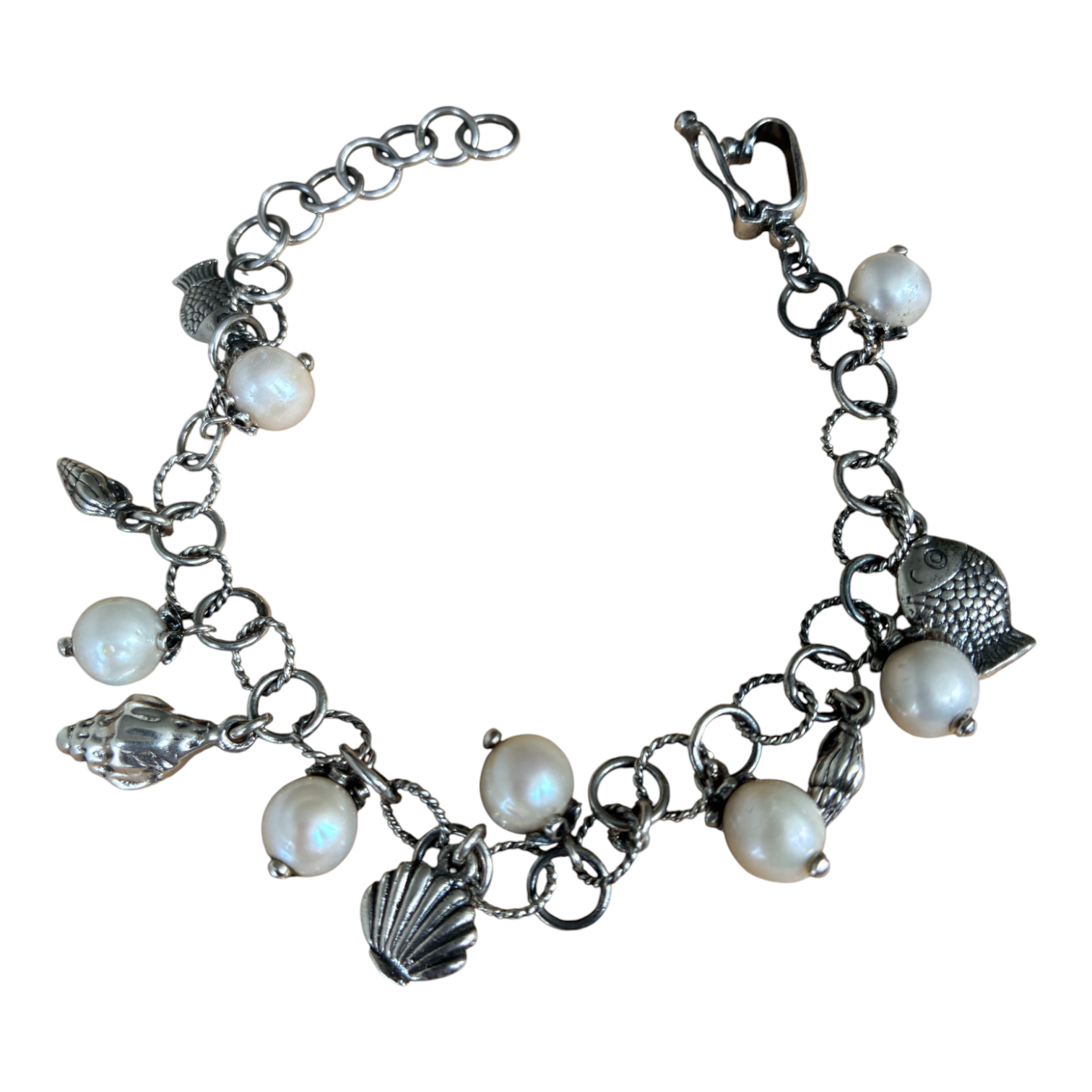 Pulsera Conchas y Perlas del rio.
