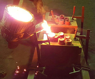Cylinders being poured at foundry