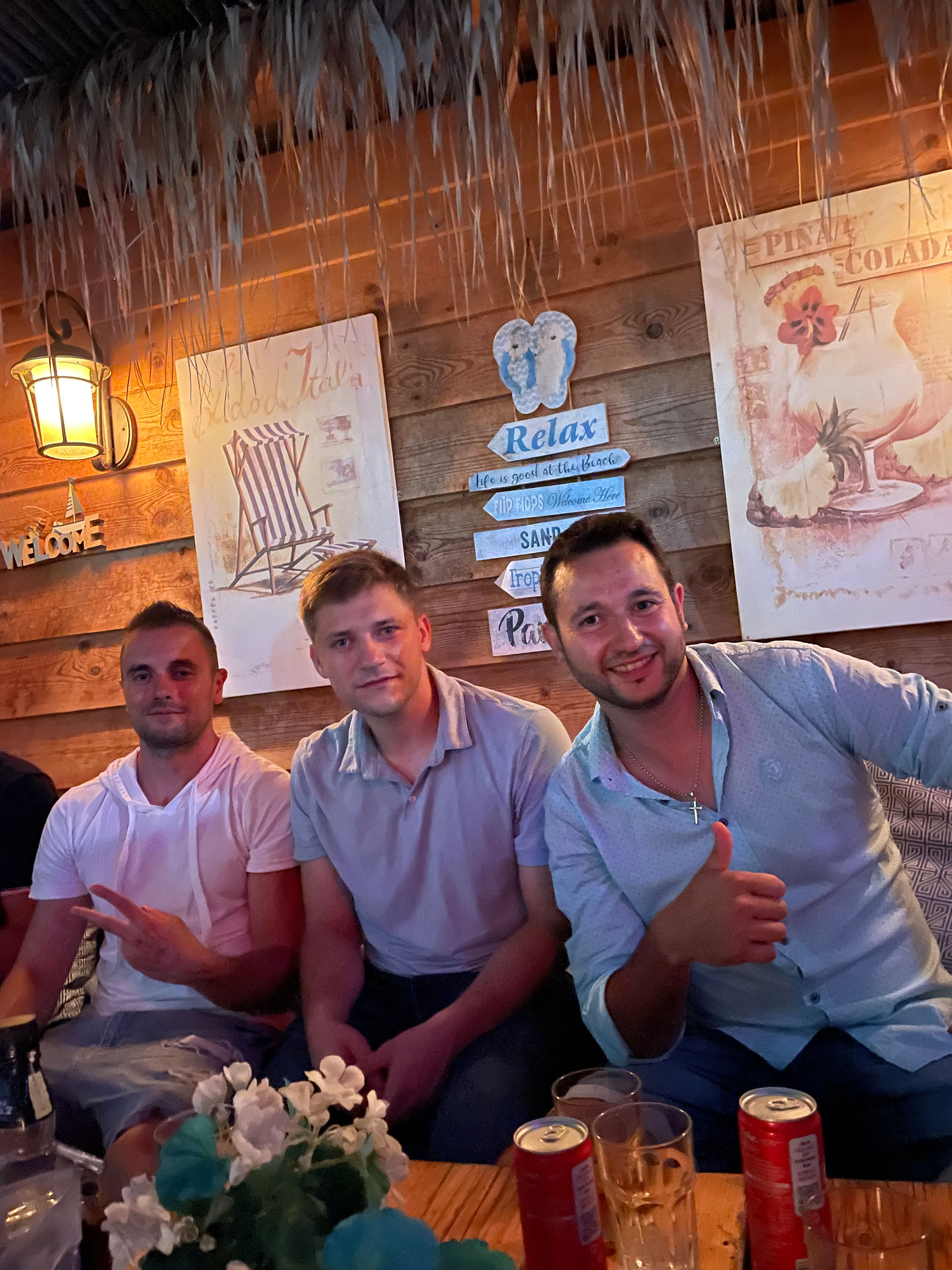 group of people in a beach bar having fun