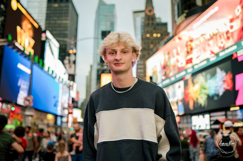 Senior boy in New York City.  Big city senior pictures.  Times Square. 