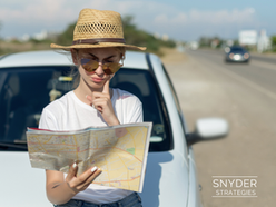 woman reading a map
