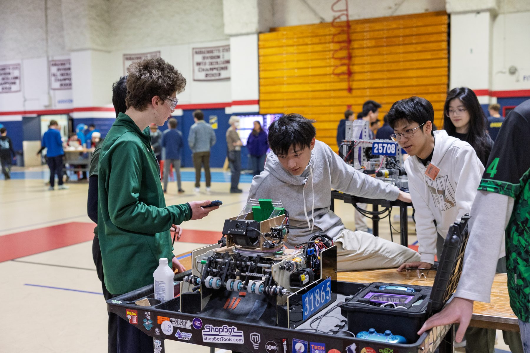 Students debugging in the pit