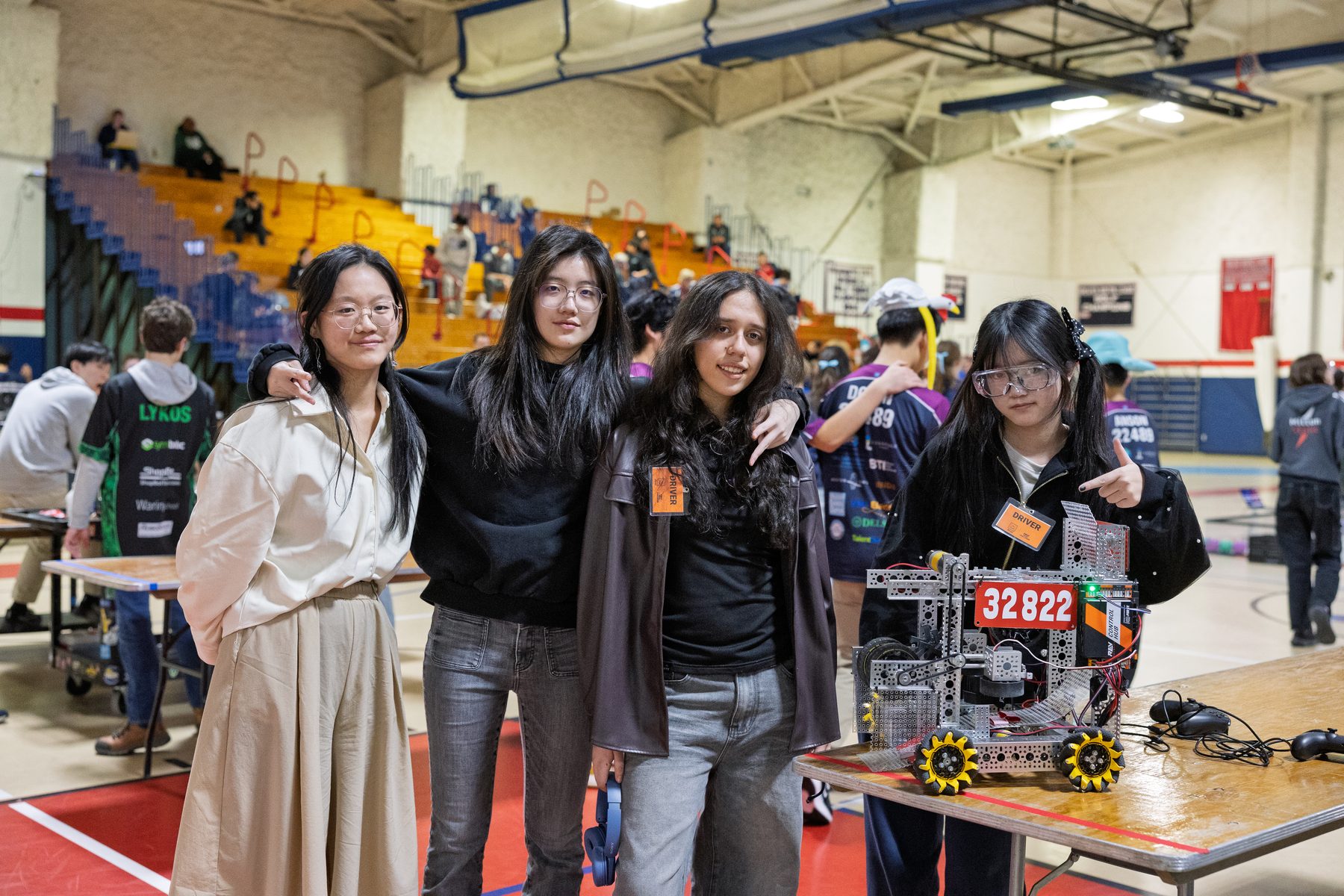 Team with robot at competition