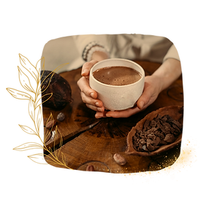 hands holding a ceremony cup of cacao