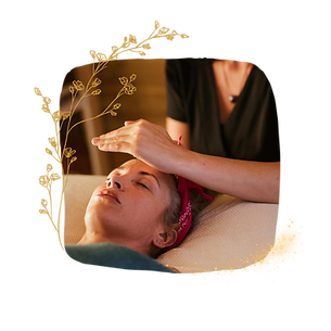 A lady receiving a reiki treatment