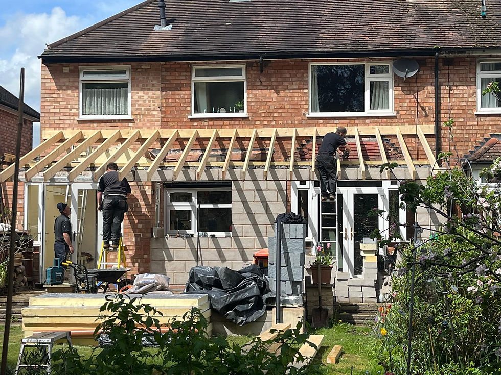 Builders constructing a home extension.