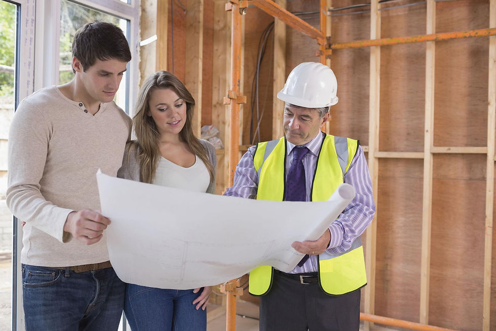 Homeowner reviewing building plans with a professional builder before work begins.