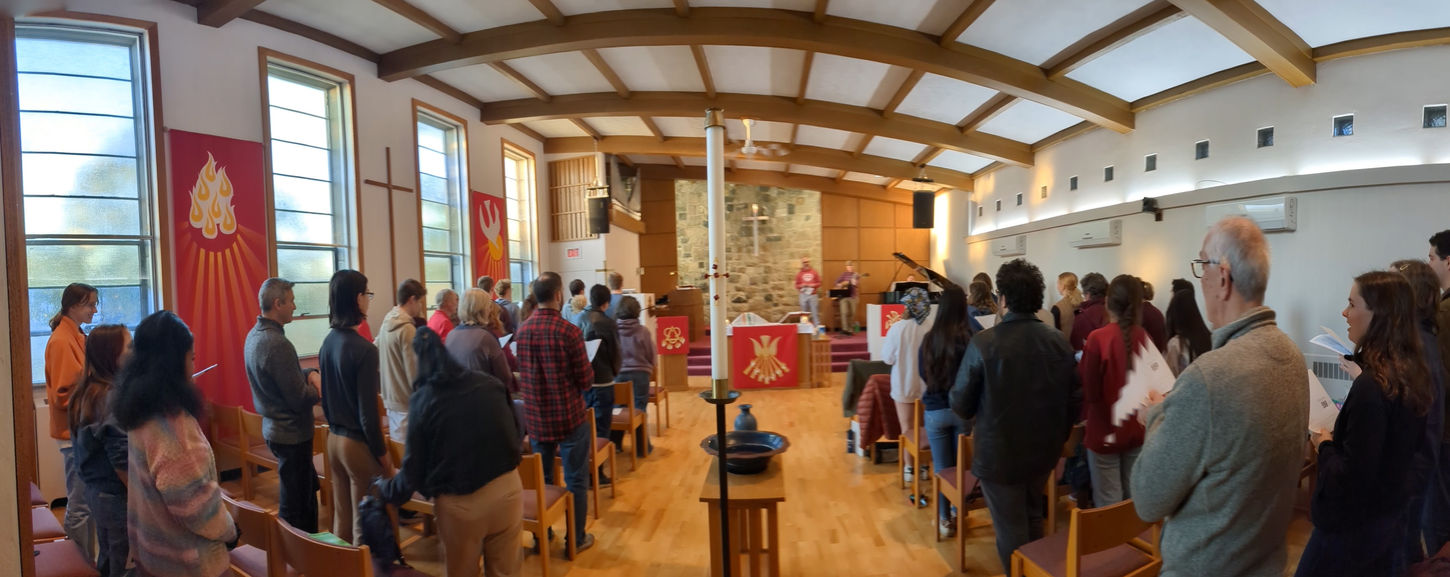 People singing in the sanctuary