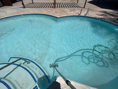 A pool in Northwest Bakersfield, being cleaned