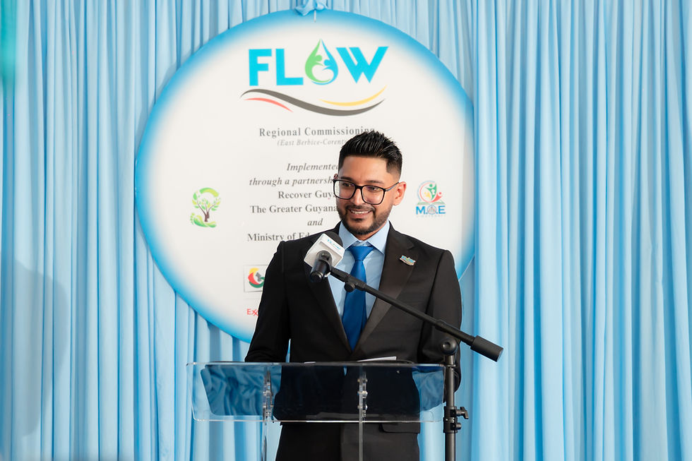 Dr. Dave Lalltoo, FLOW Lead and President of Recover Guyana, delivers remarks at the commissioning ceremony.